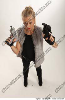 NIKOL STANDING POSE WITH TWO GUNS